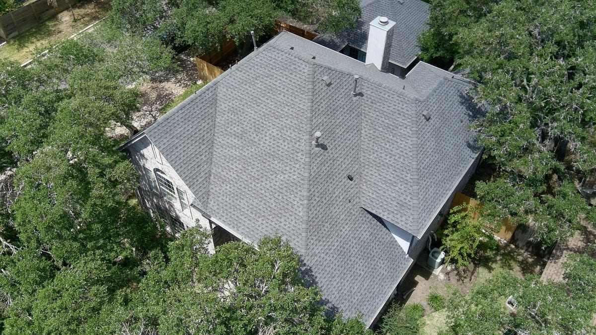 Aerial view of a finished roof replacement project